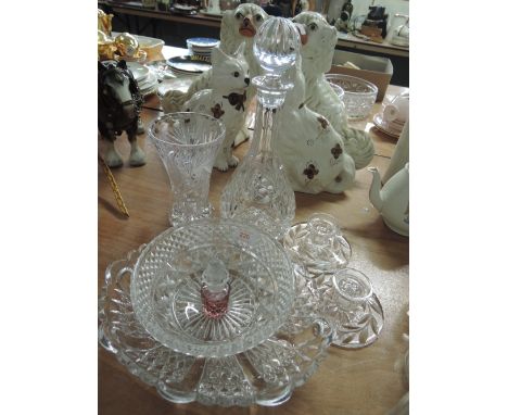 A selection of glass ware including candle stands, decanter, vase and bowls etc