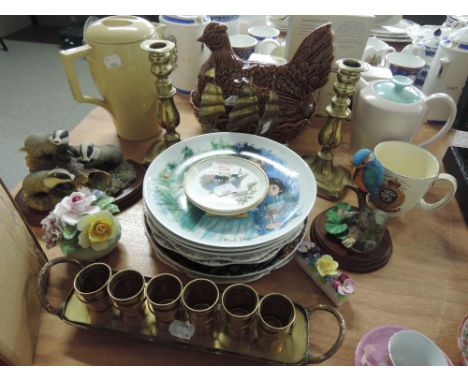 A selection of various ceramics including Poole coffee pot, collectors plates, brass candlesticks and shot glasses etc