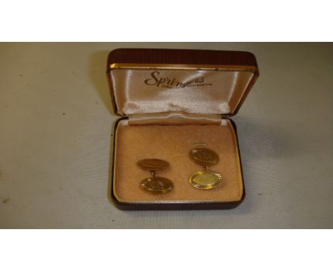 Pair of gents cuff links with engine turned decoration  Springers Jewellers case of issue