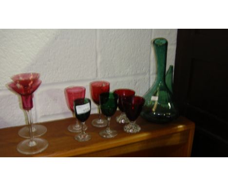 Assorted glassware including cranberry, ruby and green glasses etc.