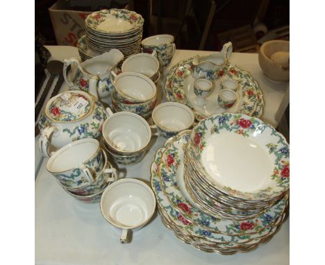 Approximately sixty pieces of Booths 'Floradora' tea and dinnerware and approximately sixty pieces of Copeland late Spode flo