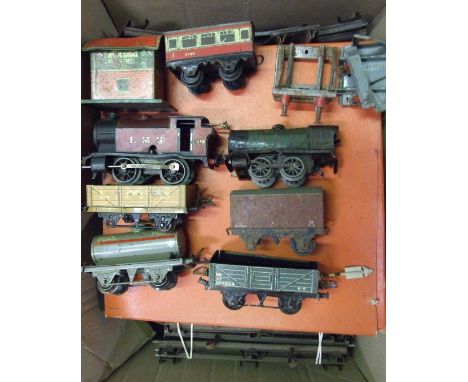 O Gauge, Hornby, a No.101 clockwork 0-4-0T Tank Engine, LMS No. 2270, another 0-4-0 locomotive, a coach, four wagons, a boxed