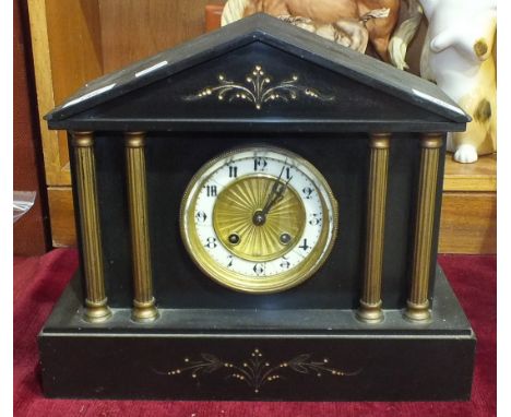 A slate-cased architectural shape striking mantel clock, 28cm high.