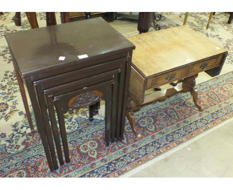 A reproduction walnut small sofa table, two torchère stands and a nest of four tables, (4).