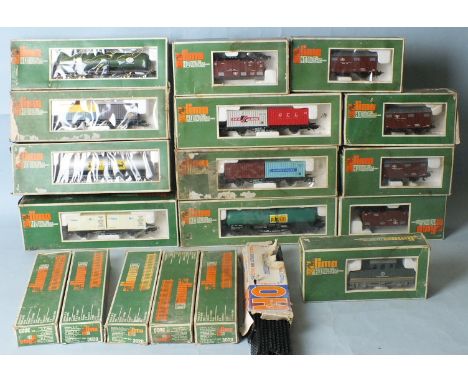 HO Gauge, Lima Volkswagenwerk Electric Locomotive, twelve wagons and a quantity of track, all boxed.