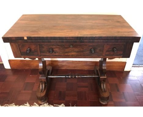 19thC rosewood foldover card table with drawer top front, red baize interior - 91 w x 75 h x 46cms d - Loss to veneer in plac