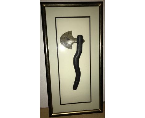 Interesting framed stone axe, 64cms x 32cms.