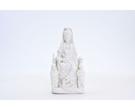 A Chinese blanc de Chine figure of Guanyin, KangxiH 22,5 cm Provenance: - Ex-collection Robert Mc Pherson (no. 26592, link). 