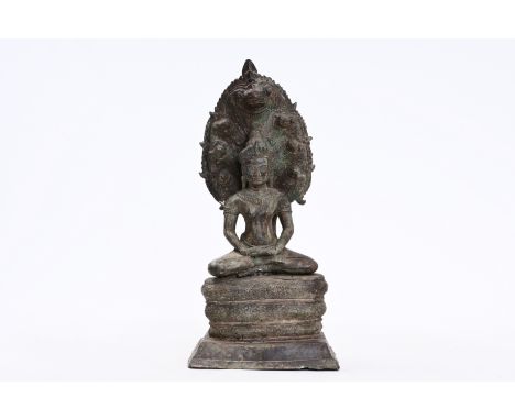 A Thai bronze figure of Buddha seated on the Naga throne, 19th C.H 61,5 cm