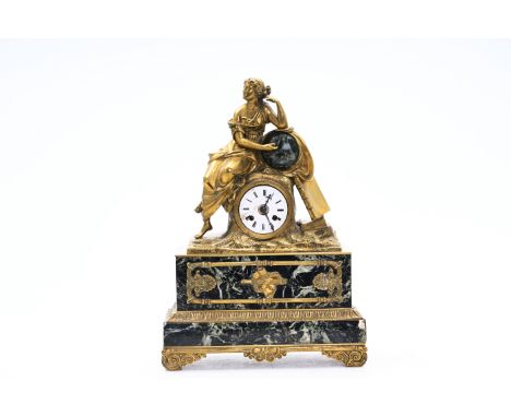 A French gilt bronze and vert de mer marble 'Geografia' mantel clock, 19th C.H 46 cm