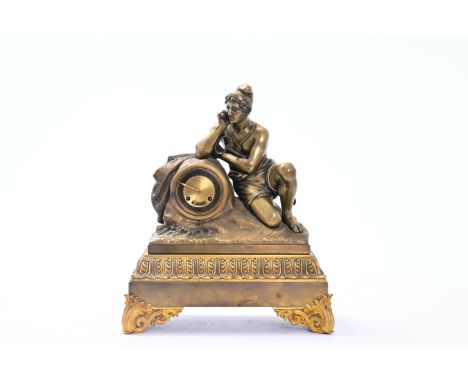 A French gilt bronze mantel clock topped with a revolutionary, 19th C.H 43 - L 36,5 - D 17,5 cm The work marked 'Christophle 