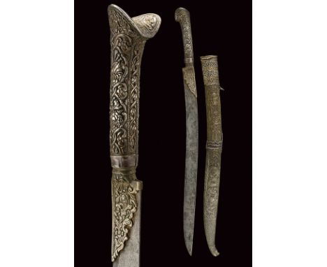 A yatagan dating: 19th Century provenance: Turkey Slightly curved, single-edged blade, stamped; silver-plated brass ring-nut 