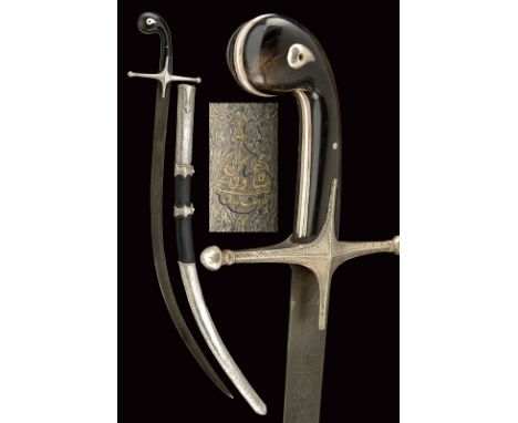 A silver mounted shamshir dating: mid-19th Century provenance: Turkey Curved, flat, single-edged blade of fine, dark damask, 