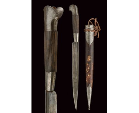 A knife with scabbard dating: late 19th Century provenance: Russia Straight, single-edged blade with fuller, with tip slightl