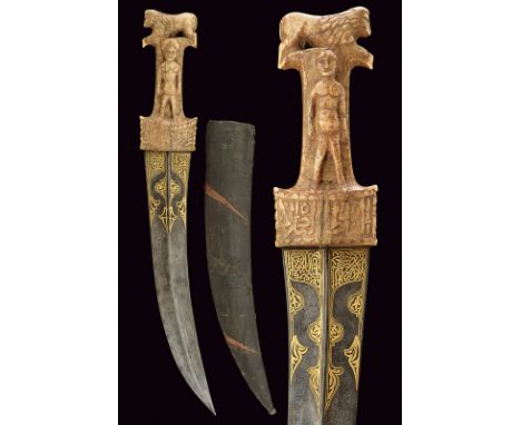 A very rare kandshar dating: early 19th Century provenance: Indopersia Long, wide, curved, double-edged blade with central ra