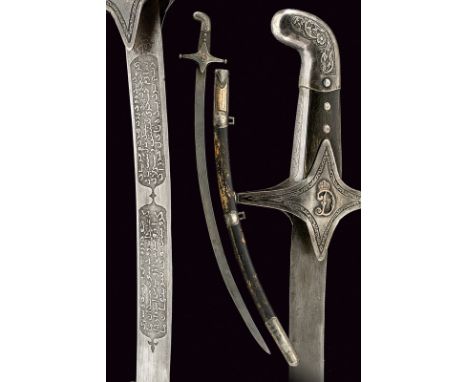 A shamshir dating: 20th Century provenance: Caucasia Curved, single-edged blade with two cartouches at the base featuring ins