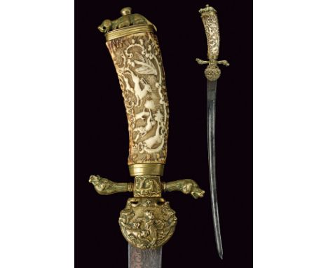 A beautiful hunting hanger dating: 18th Century provenance: Germany Slightly curved, single -and false-edged blade with centr