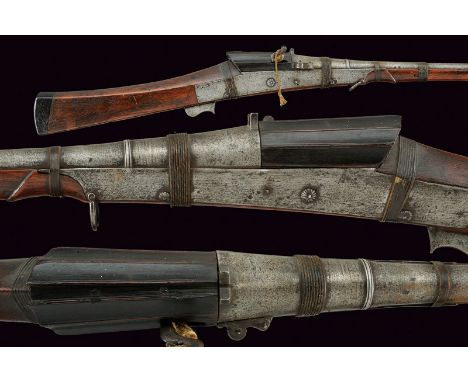 A match-lock Torador dating: second quarter of the 19th Century provenance: India Long, smooth, round, 17 mm cal. barrel with