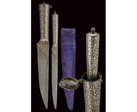 A kard with hidden knife dating: early 20th Century provenance: Persia Straight, single-edged, damask blade; iron grip richly