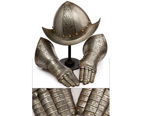 A morion and a pair of gauntlets dating: 19th Century provenance: Flanders Helmet worked in two pieces, engraved with bands; 