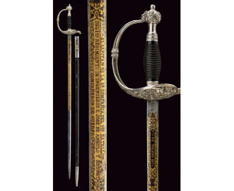 A silver mounted presentation sword dating: third quarter of the 19th Century provenance: Spain Straight, double-edged blade 