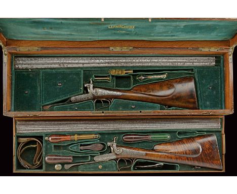 Two cased pin-fire double-barrelled shotguns by Lefaucheux dating: third quarter of the 19th Century provenance: Paris Wooden