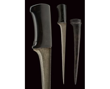 A pesh-kabz dating: mid-19th Century provenance: Afghanistan Thin, straight, single-edged, damask blade with "T"-back; smooth