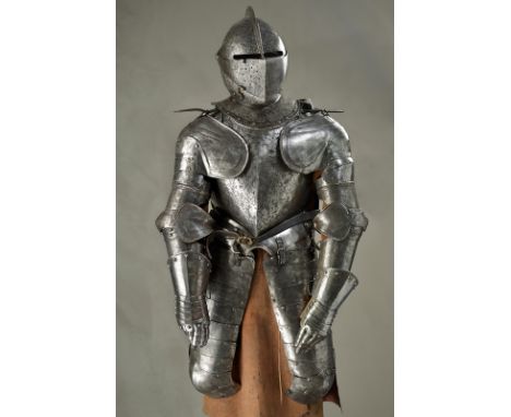 A composite curassier's armour dating: first quarter of the 17th Century provenance: Europe Closed helmet in two parts, avera