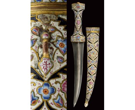 A fine enamelled kandshar dating: late 18th Century provenance: Indopersia Curved, double-edged, damask blade ribbed at the c