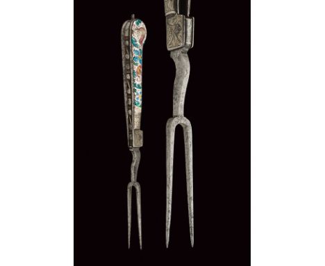An enamelled folding fork dating: 18th Century provenance: Germany With two iron prongs; iron grip with carved back, copper g