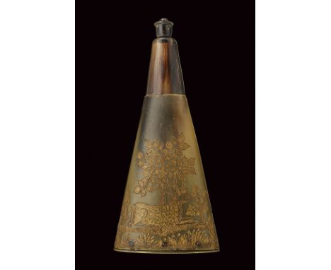 A powder-flask dating: 18th Century provenance: Germany Of pressed cow horn, trapezoidal shape, featuring beautiful, gilt eng