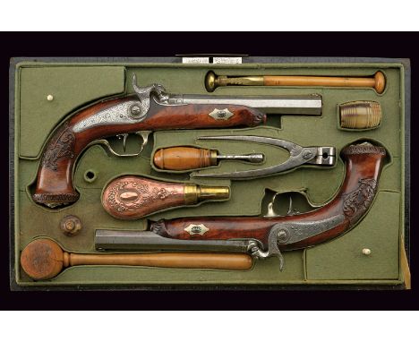 An interesting cased pair of percussion pistols by Hopfe from noble property dating: mid-19th Century provenance: Belgium Oct