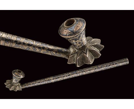 A silver pipe dating: late 19th Century provenance: Caucasia Chamber with flower-shaped base, cylindrical body and mouthpiece
