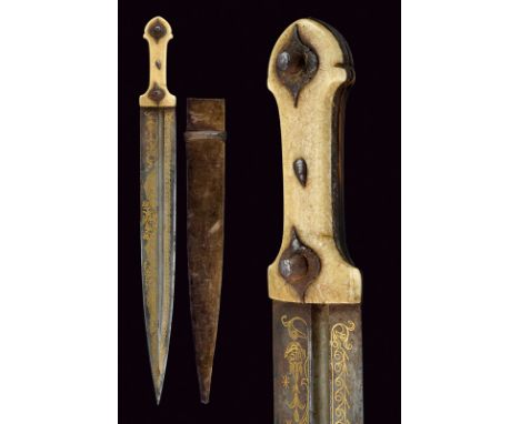 A gilt kindjal dating: 19th Century provenance: Caucasia Straight, double-edged, damask blade, ribbed at the centre and provi