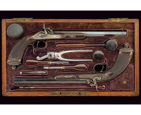 A cased pair of percussion pistols by Gastinne Renette dating: mid-19th Century provenance: Paris Octagonal, rifled, 11 mm ca
