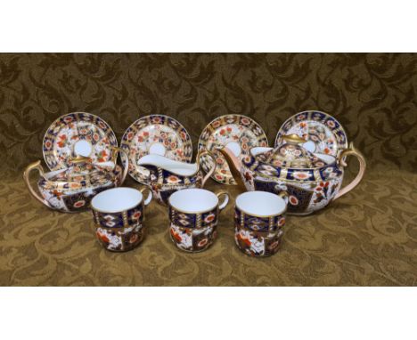 Davenport Old Imari teaset, 2614 Imari pattern comprising teapot, covered sugar, cream jug, 4 saucers and 3 cups.  Teapot has