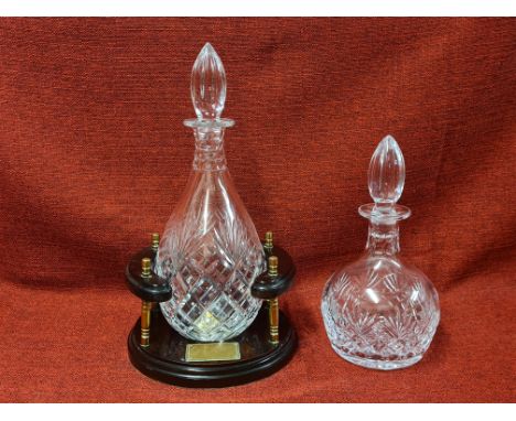 Royal Doulton ships decanter and stand and a Royal Doulton globular spirit decanter.