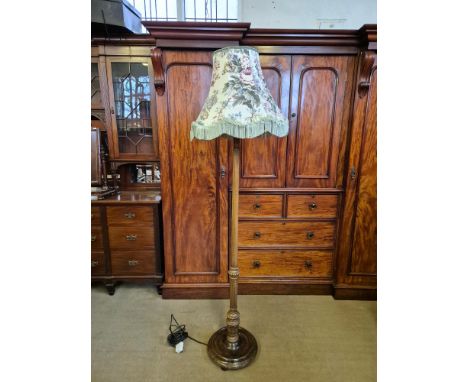 Edwardian mahogany standard lamp with fluted, beaded and carved column and shade.