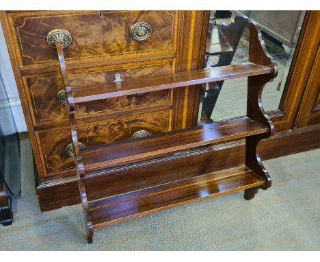 Modern mahogany wall hanging shelf with shaped end supports.  72cm wide x 16cm deep x 76cm high.