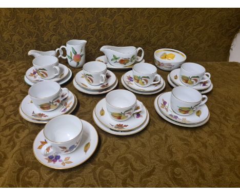 Royal Worcester Evesham 7 teacup trios, gravy boat, jug, bowl, etc.