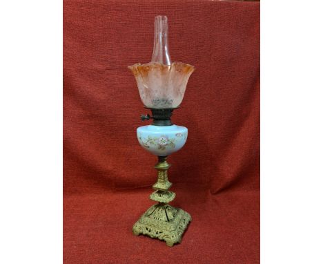Victorian oil lamp with decorated opaline glass vessel, cranberry shade (badly damaged), for parts.
