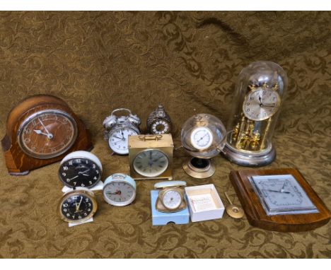 Assorted clocks and barometers, alarm clocks, travel clocks, Schatz German anniversary clock and an unusual Sputnik barometer