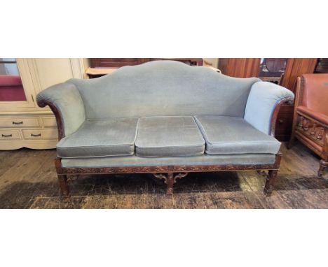 In the manner of William Vile an early 20th century sofa, carved mahogany frame with carved flowers, rosettes, acanthus leave