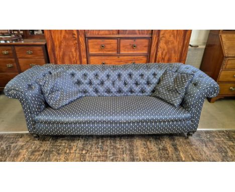 Victorian upholstered Chesterfield sofa with ebonised and gilt turned legs in excellent clean condition.  210cm long x 75cm d