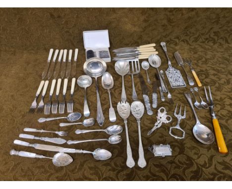 Mixed EPNS cutlery including mother of pearl, grape scissors, ladle, fish sets, etc.