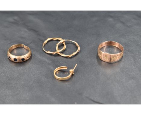 A small quantity of 9ct gold and yellow metal jewellery including asignet ring, broken ring and earrings, approx 4.7g