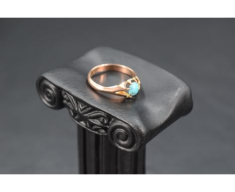 A 9ct rose gold signet ring having turquoise cabochon in a gypsy mount, size Q &amp; approx 3g