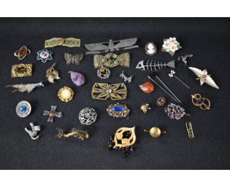 A selection of vintage costume brooches and buckles including Scottish, ceramic, enamelled etc