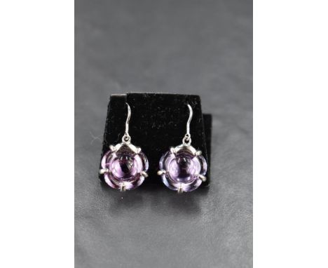 A pair of silver loop drop earrings by Baccarat having purple glass moulded discs on silver mounts, approx 5.2g gross