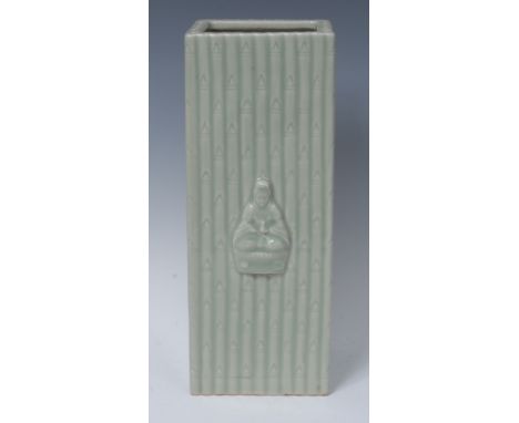 A Chinese celadon square vase, moulded with Guan Yin alternated with Yin and Yang, on a bamboo ground, 28cm high, the seal ma